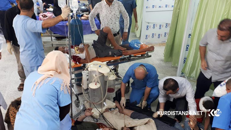 A mini bus carrying two Iraqi tourist families drove off a mountainous road in the Kurdistan Region, killing and injured tens of people  Aug. 30, 2019. (Photo: Kurdistan 24/Karwan Yara)